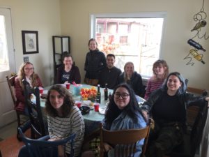 Betsy O'Donovan and students around her kitchen table. 