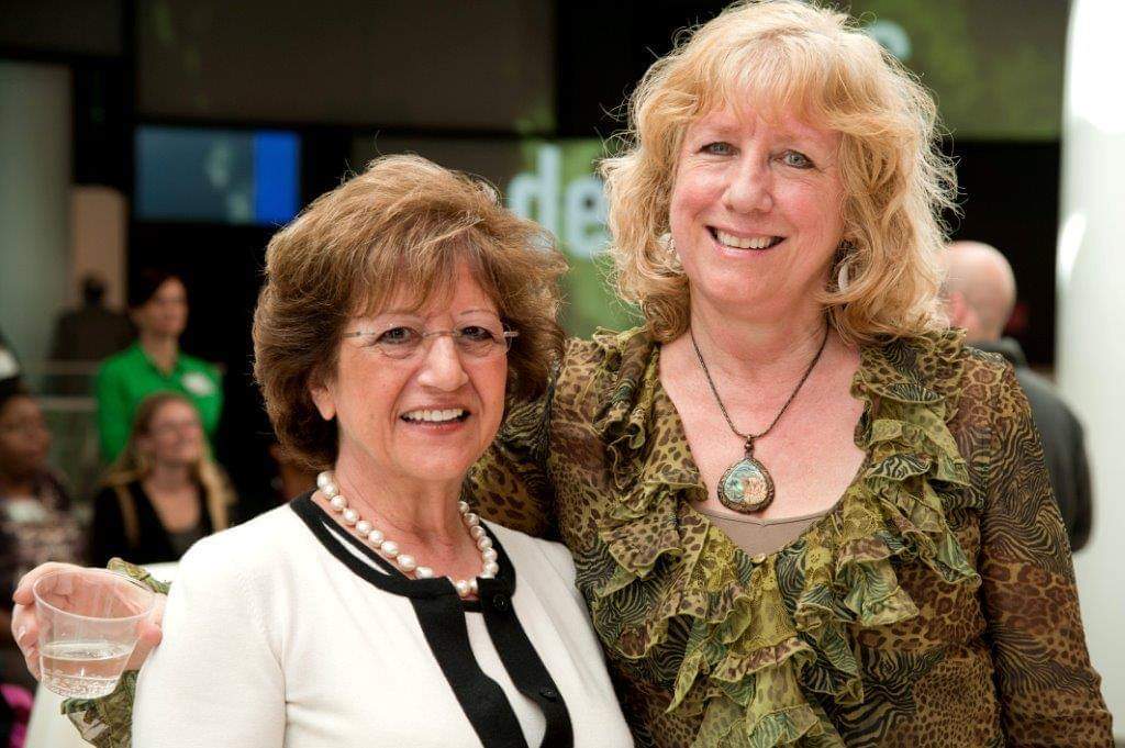 Sarah Logan Gregory (right) with Poly Potter, the founding managing editor of the EID journal, at the CDC launch and reception of Potter’s book.