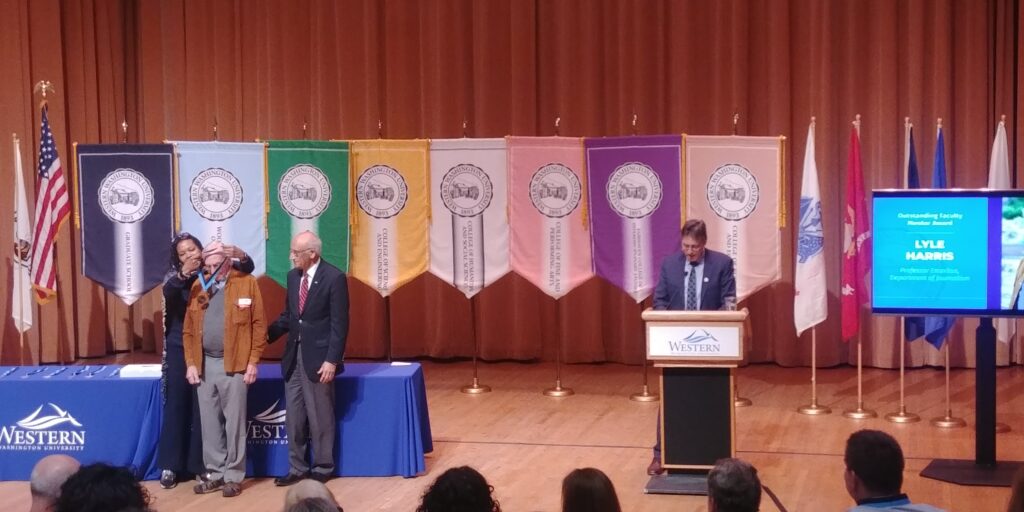 Professor Emeritus Lyle Harris receives the Outstanding Faculty Mentor Awards during the Celebration of Excellence on Thursday, May 25, 2023.