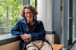 Questen Inghram sits for a portrait during a campus visit on May 28, 2024. Inghram, a 2023 news-ed grad, is working for the Yakima Herald-Republic with the support from the Murrow News Fellowship, an initiative of Washington State University that places reporters across the state of Washington to cover civic issues. Photo by Maylis Laverne