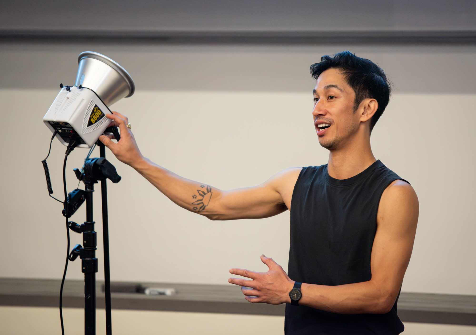 Mark Malijan ('09) demonstrates lighting techniques during the Bellingham Visual conference on Saturday, Oct. 19, 2024. // Photo by Finn Wendt